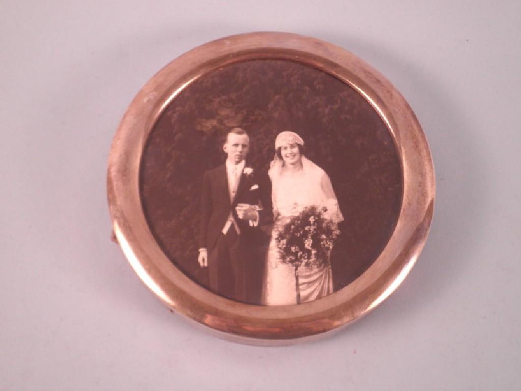 Appraisal: A silver circular photograph frame London cm diameter