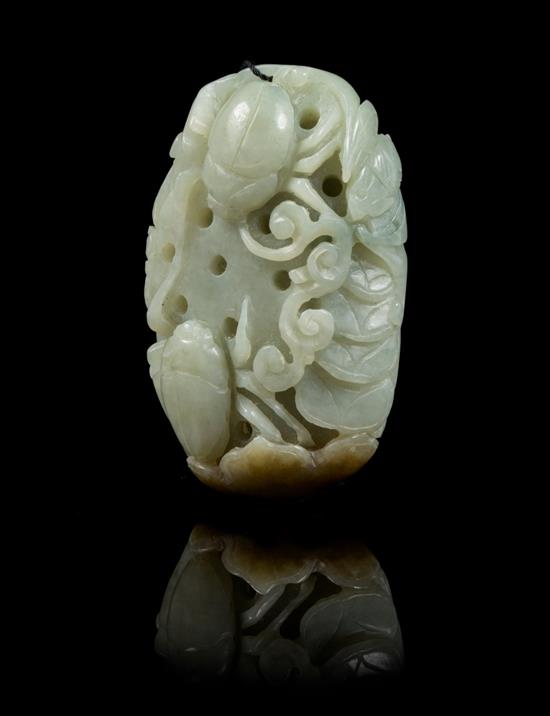 Appraisal: Sale Lot A Carved Jade Toggle the celadon stone relief