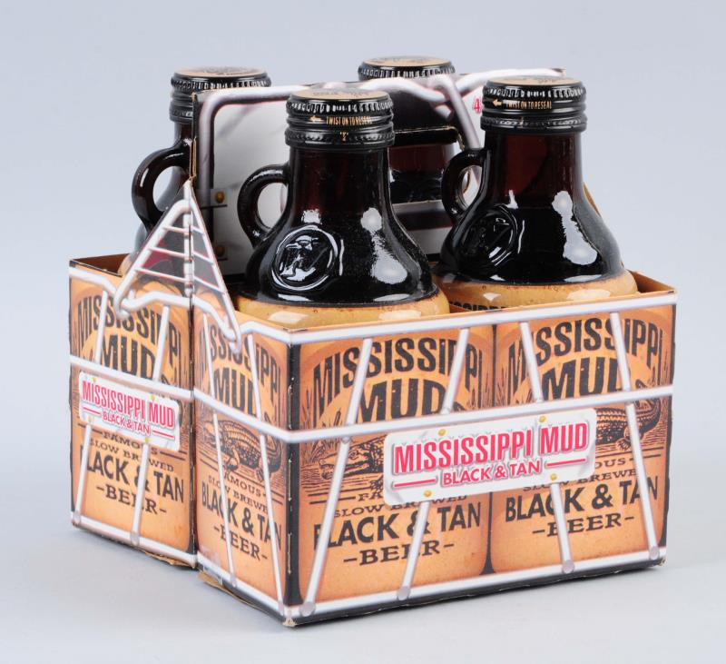 Appraisal: Mississippi Mud Beer -Pack With Carrier This lot includes four