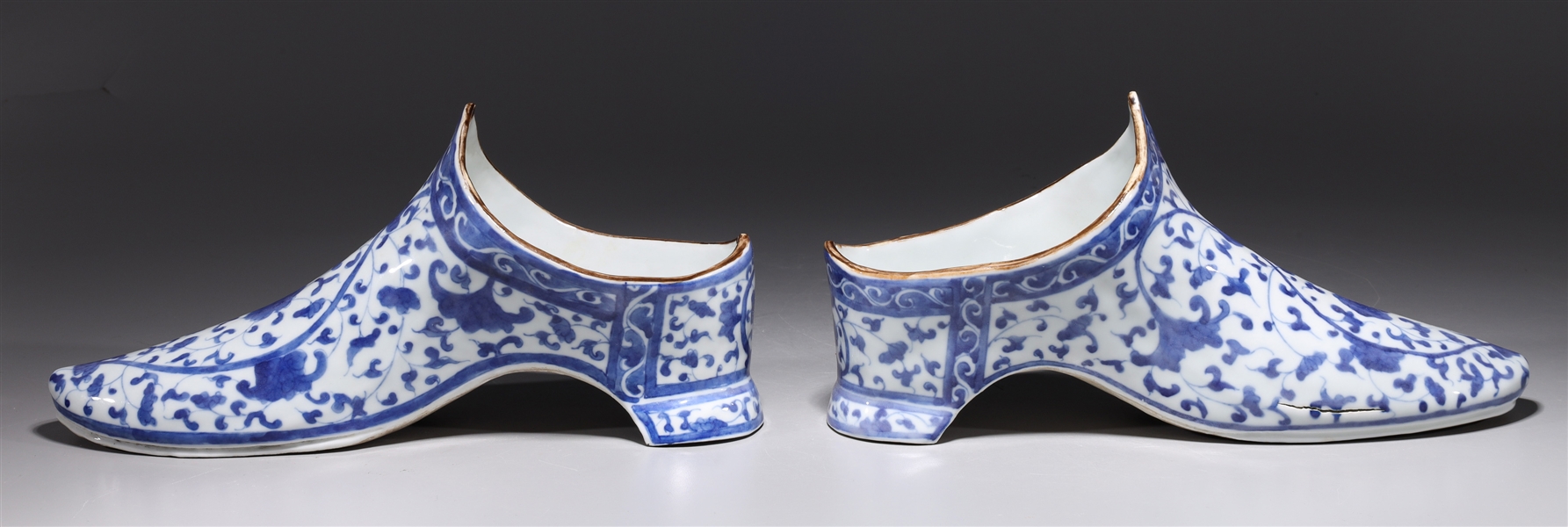 Appraisal: Pair of Chinese blue and white porcelain shoes wit allover