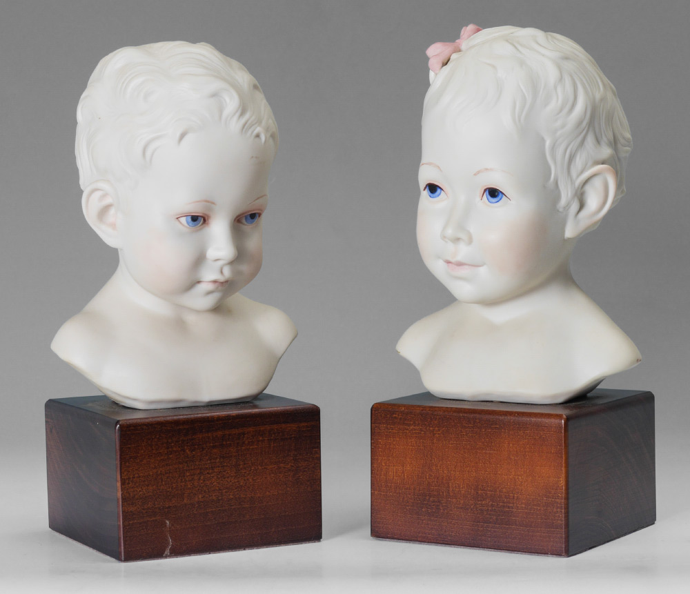 Appraisal: PAIR OF CYBIS PORCELAIN BUSTS Depicting young children a boy