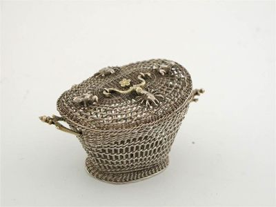 Appraisal: An unusual parcel-gilt wire-work creel with applied cast crustaceans th