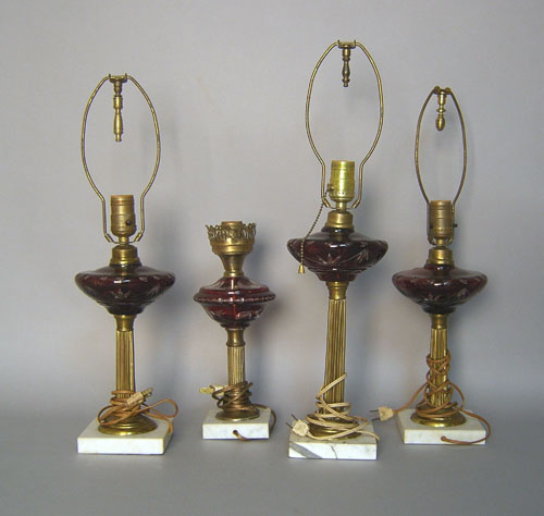 Appraisal: Four cranberry cut glass table lamps early th c with