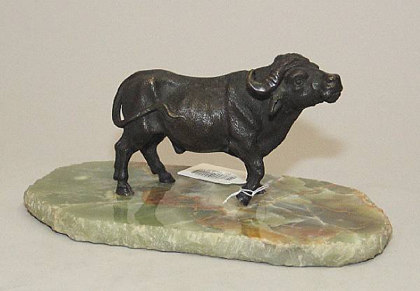 Appraisal: A patinated bronze figure of a Cape Buffalo late th