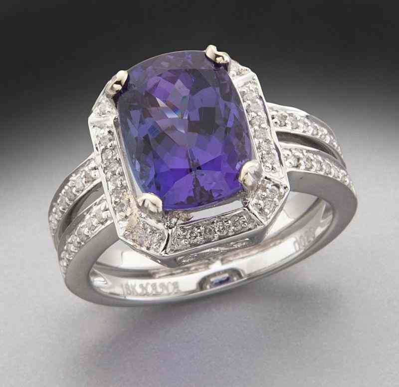 Appraisal: K gold diamond and tanzanite ringfeaturing a central modified cushion