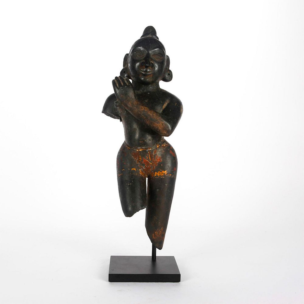 Appraisal: TH CENTURY BASALT STATUE DANCING KRISHNA EASTERN INDIA The youthful