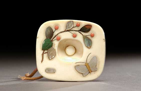 Appraisal: ANTIQUE IVORY MANJU NETSUKE Antique carved ivory manju netsuke of