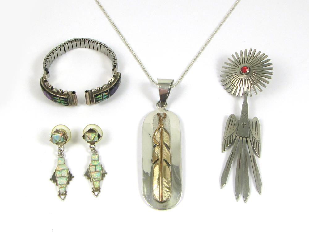 Appraisal: FOUR ARTICLES OF NATIVE AMERICAN STERLING SILVER JEWELRY including a