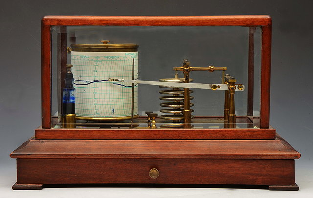 Appraisal: AN ARMY AND NAVY MAHOGANY CASED BAROGRAPH with bevelled five