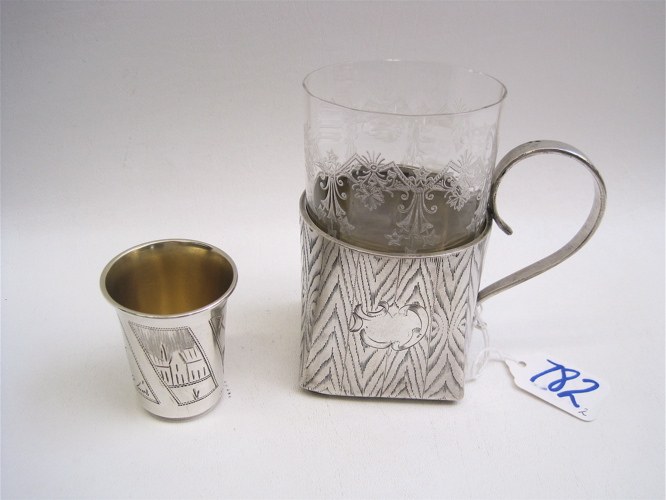 Appraisal: TWO RUSSIAN SILVER PIECES a handled glass holder H with