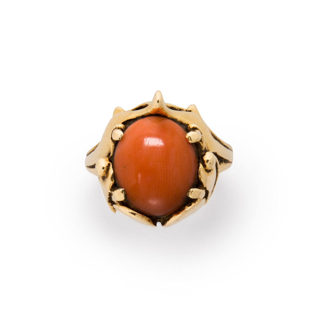 Appraisal: A CORAL AND FOURTEEN KARAT GOLD RING A coral and