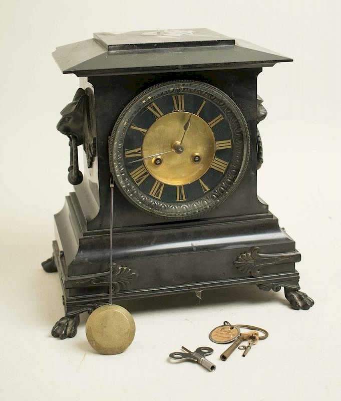 Appraisal: French Mantle Clock French mantle clock in black stone case