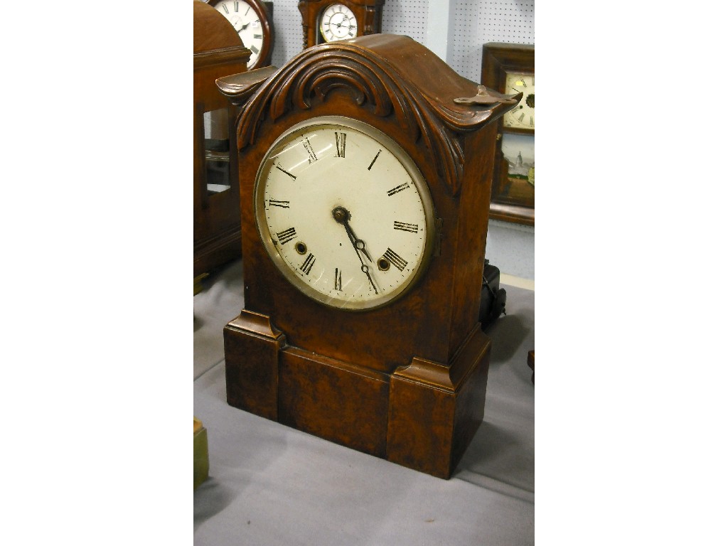 Appraisal: Walnut two train mantel clock the white dial within an