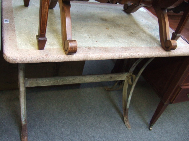 Appraisal: A mid th century wrought iron centre table with rectangular