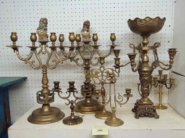 Appraisal: Lot six brass candelabra including pair with lions and shields