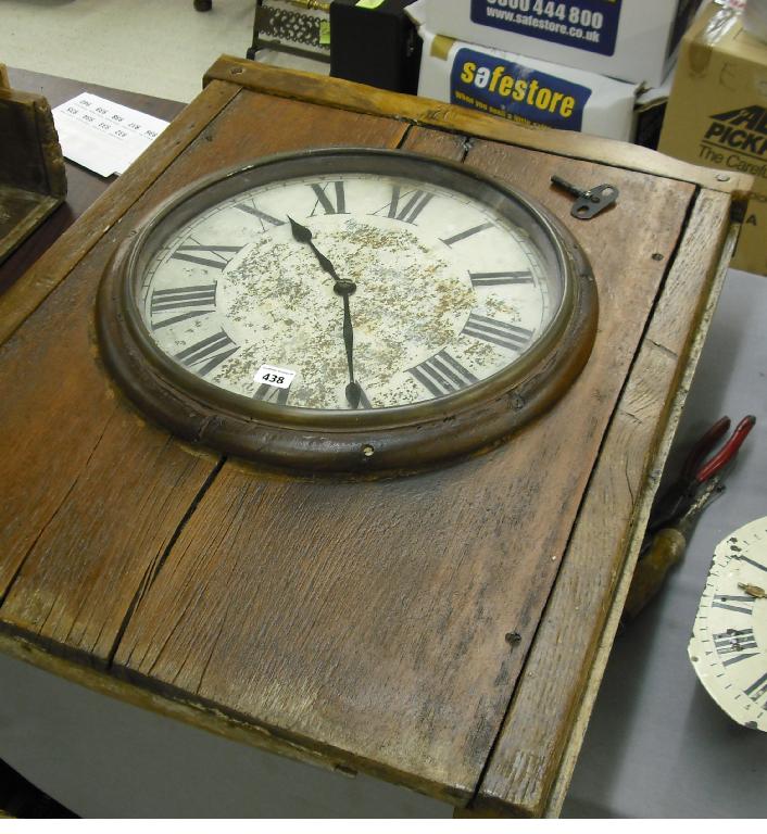 Appraisal: Interesting old single fusee wall dial within a rustic oak