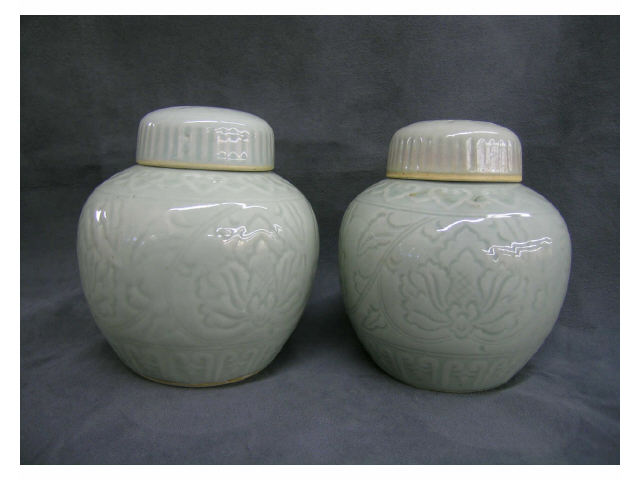 Appraisal: Pair of Celadon lidded Jardinieres