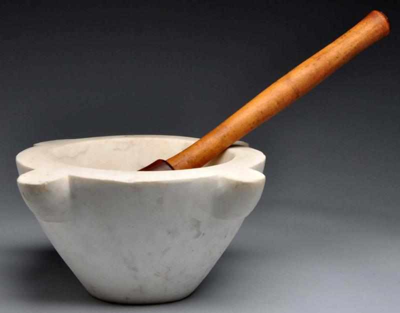 Appraisal: Very Large Marble Mortar Wood Pestle Description Circa s Huge