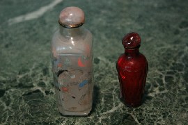 Appraisal: A Chinese squareform snuff bottle in glass the painted interior