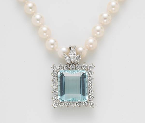 Appraisal: An aquamarine and diamond pendant-enhancer together with a cultured pearl