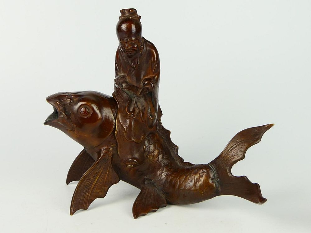 Appraisal: VINTAGE CHINESE BRONZE IMMORTAL ON KOI FISH BRONZE A vintage