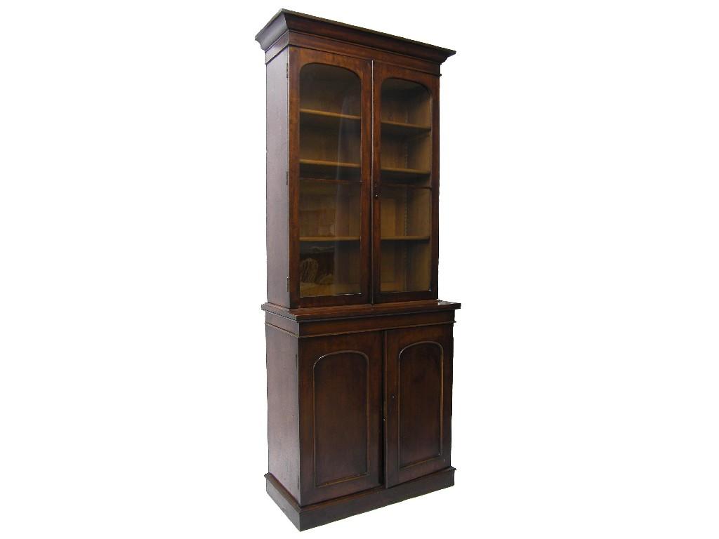 Appraisal: Good quality th century mahogany glazed bookcase with arched glazed