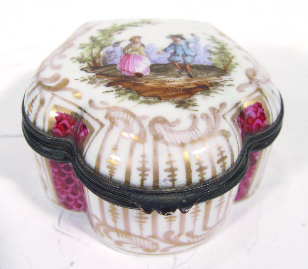 Appraisal: Shaped continental porcelain trinket box and cover hand painted with