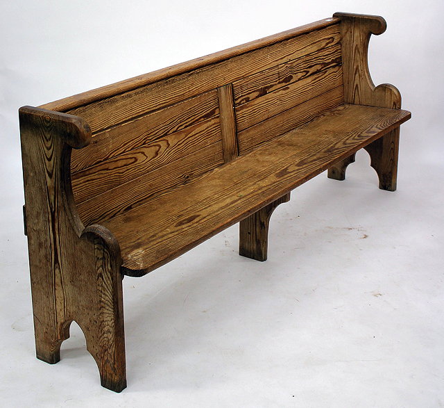 Appraisal: AN OLD PITCH PINE PEW with shaped ends cm wide