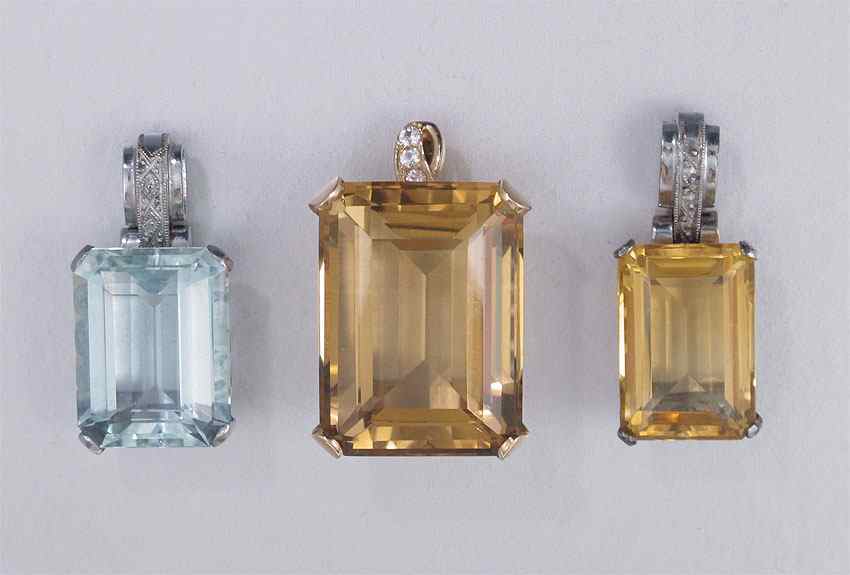 Appraisal: CITRINE AQUAMARINE PENDANTS Two K pendants one yellow gold and