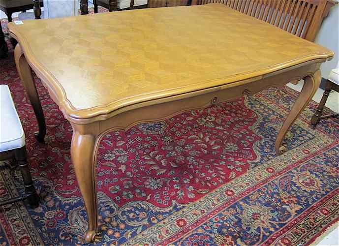 Appraisal: FRENCH PROVINCIAL STYLE OAK PARQUET DINING TABLE a rectangular draw-leaf