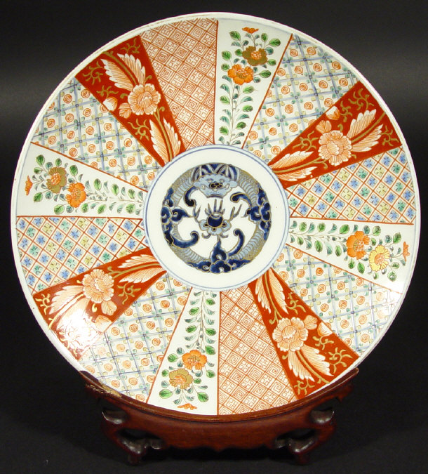 Appraisal: Japanese Imari porcelain plate enamelled with panels of flowers and