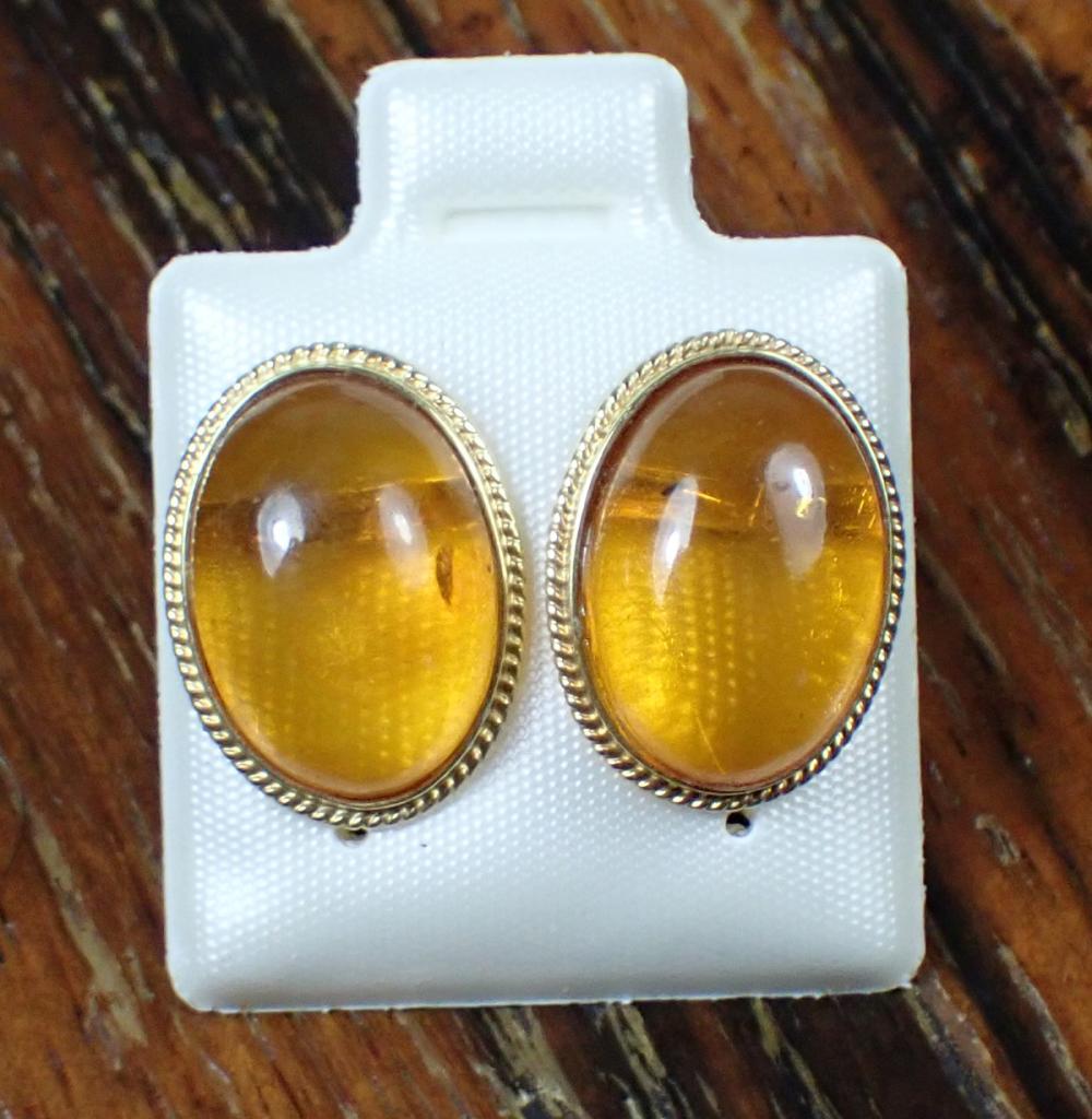 Appraisal: PAIR OF AMBER AND FOURTEEN KARAT GOLD EAR STUDS each