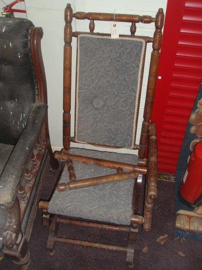 Appraisal: A late Victorian rocking chair in beech with spindle turned