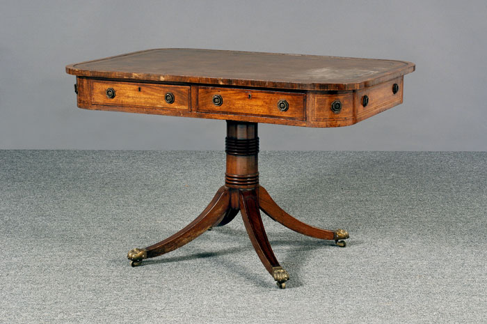 Appraisal: REGENCY MAHOGANY LIBRARY TABLE The rectangular crossbanded top with tooled