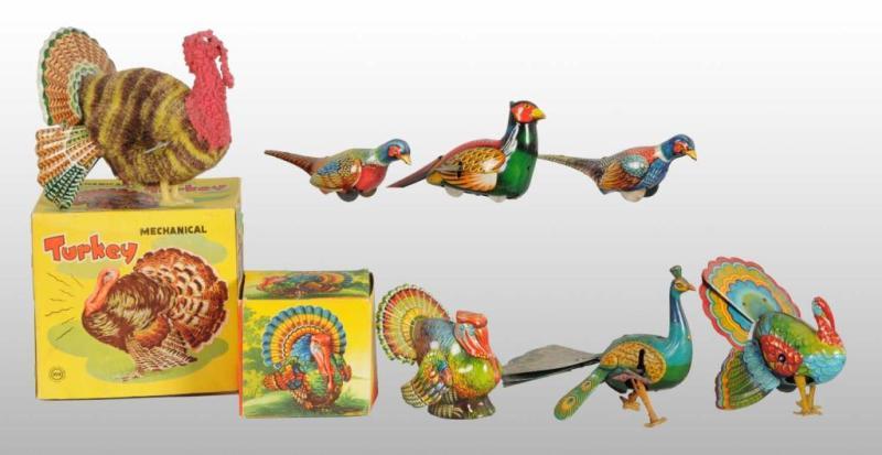 Appraisal: Lot of Turkey Peacock Pheasant Wind-Up Toys Description Working Includes