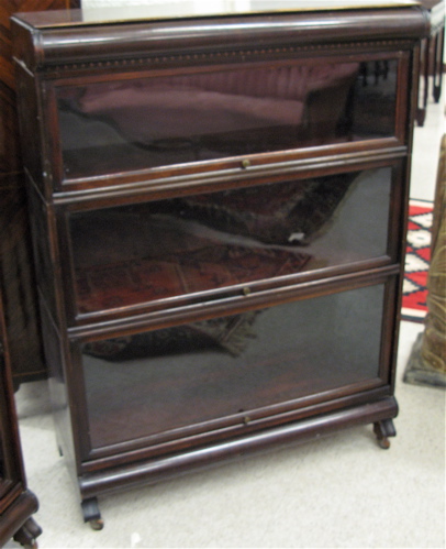 Appraisal: A SET OF THREE STACKING MAHOGANY BOOKCASES American early th