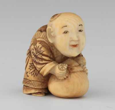 Appraisal: A Carved Ivory Netsuke of a Pot Maker The smiling