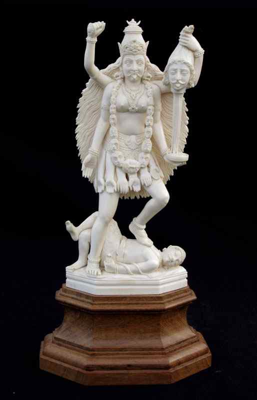 Appraisal: CARVED IVORY DEPICTING HINDU GODDESS KALI Symbolizing the link between