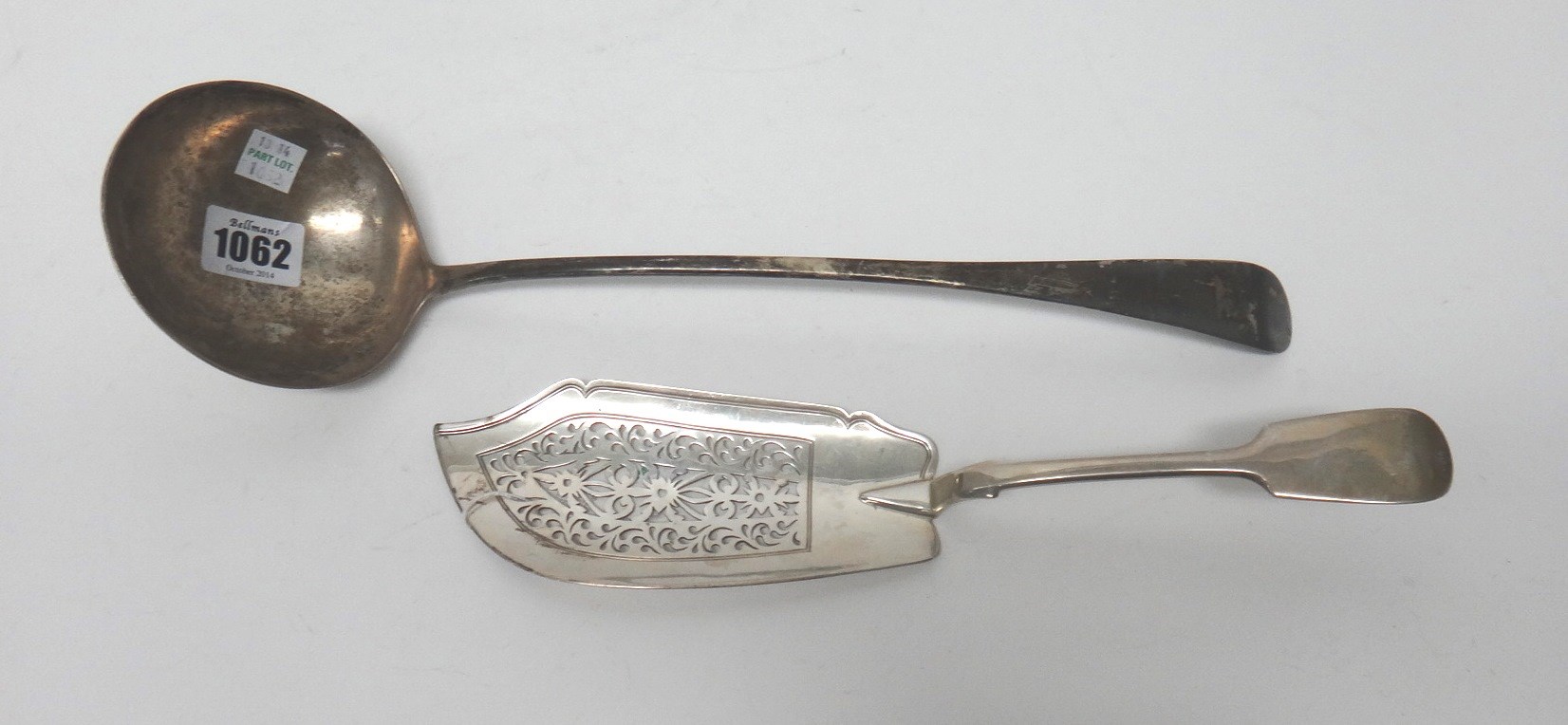 Appraisal: A Scottish silver soup ladle crest engraved Edinburgh the date