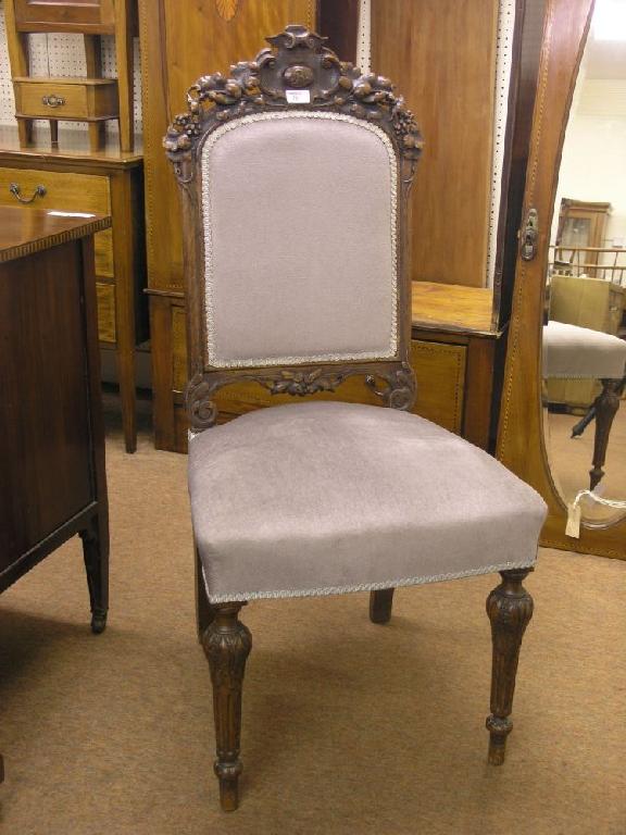 Appraisal: A late th century oak single chair carved with grapes