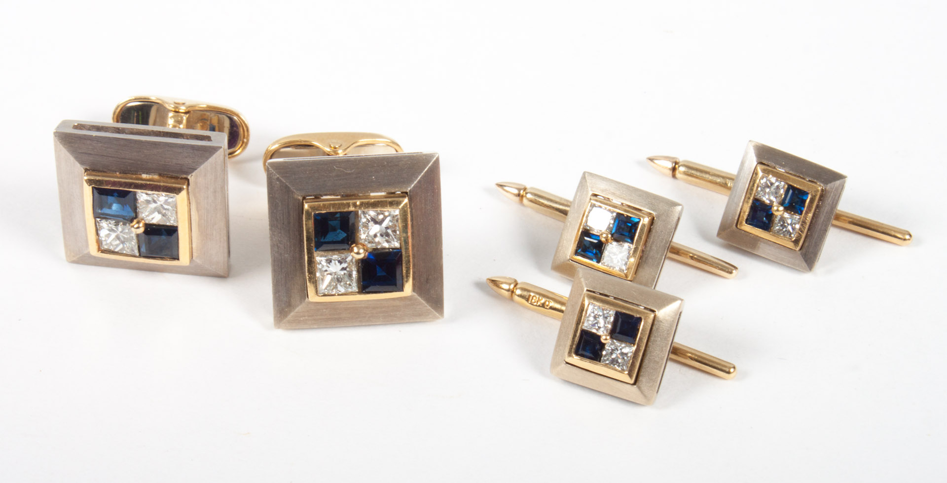 Appraisal: Pair of K gold diamond sapphire cuff links two-tone gold