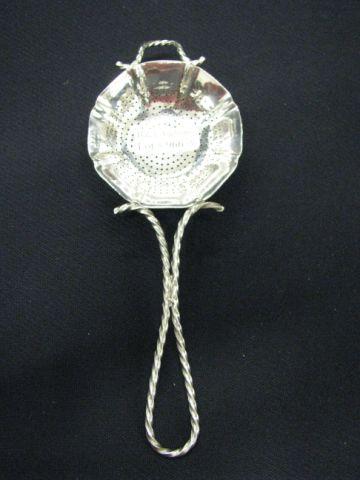 Appraisal: Sterling Silver Tea Strainer floraform with twist handle