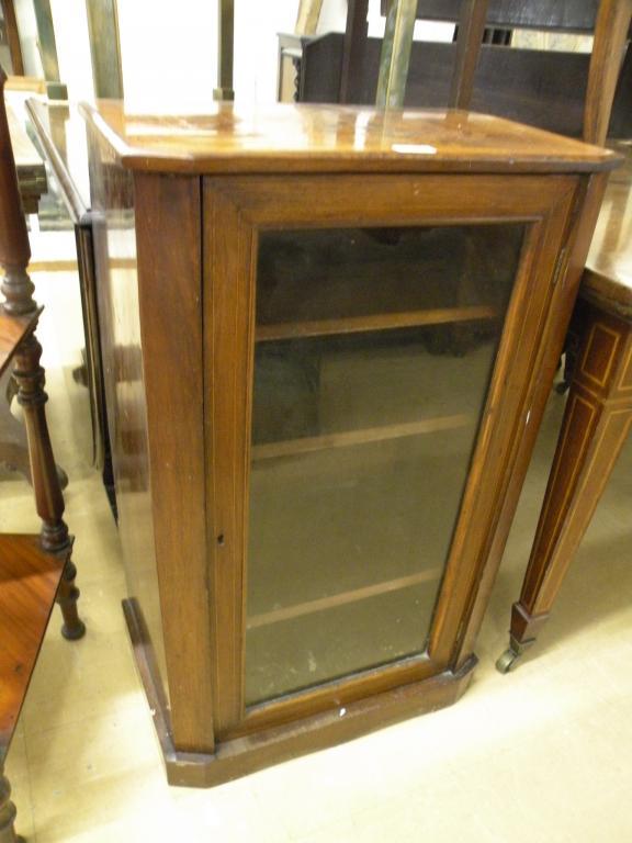 Appraisal: A Victorian walnut a sycamore banded music cabinet with one