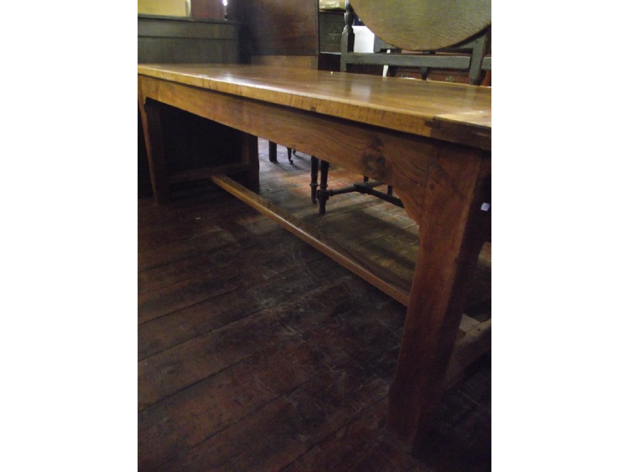 Appraisal: A Continental cherrywood farmhouse table of refrectory form the heavy