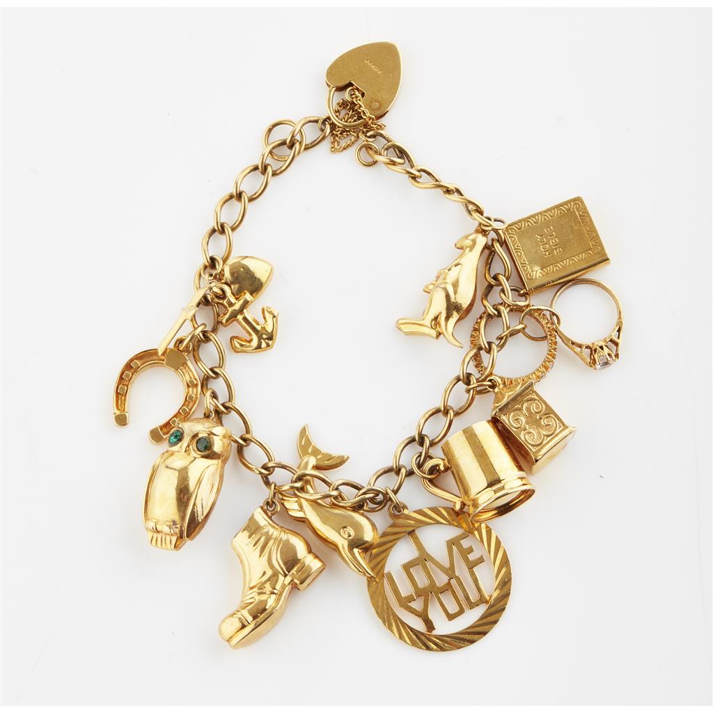 Appraisal: A ct gold charm bracelet composed of belcher links suspending