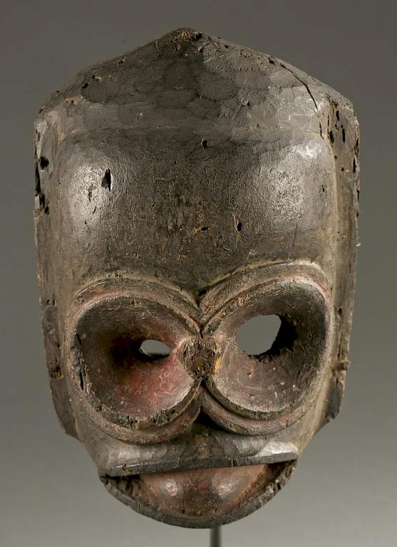 Appraisal: Ibibio face maks th century A polychrome face mask with