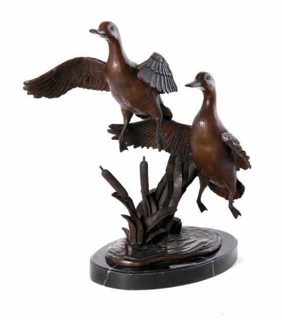 Appraisal: Bronze sculpture of rising ducks after Bayre Continental th century