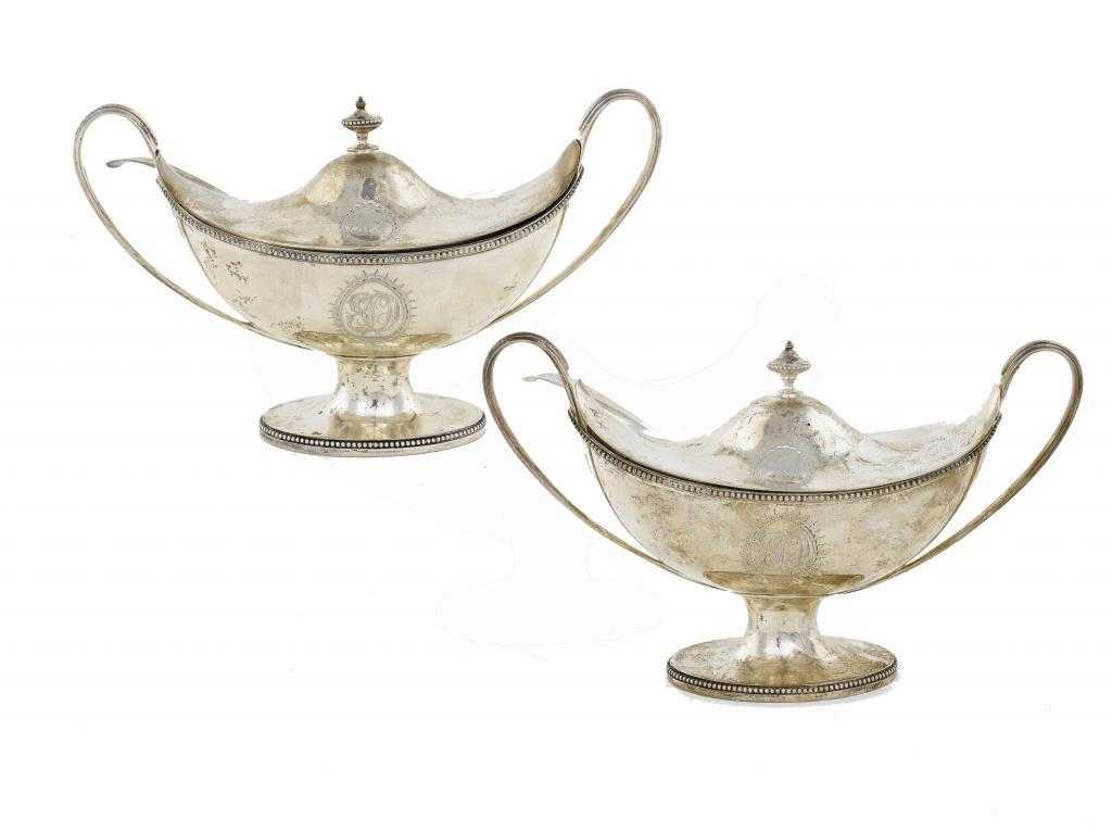 Appraisal: A PAIR OF GEORGE III OVAL SAUCE TUREENS AND COVERS