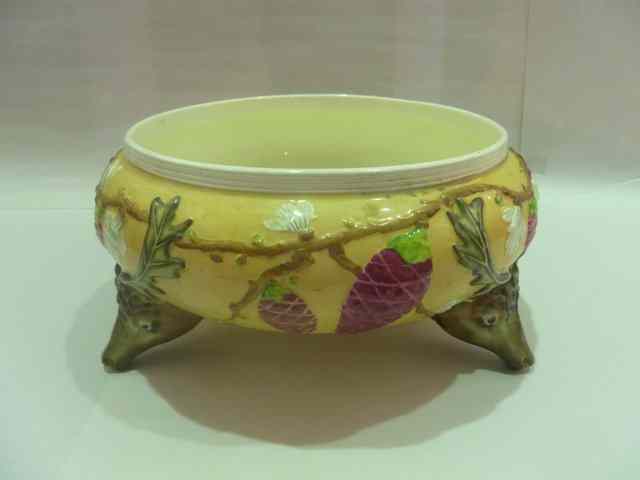 Appraisal: A LEE AND WIGFULL POTTERY FRUIT BOWL with raised fruit