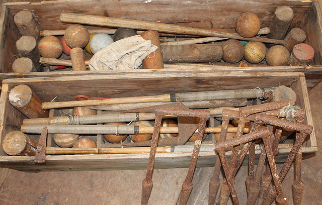 Appraisal: A PART CROQUET SET with various mallets balls and hoops